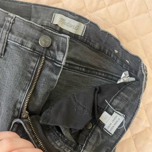 Madewell distressed black skinny jeans. Size 25.